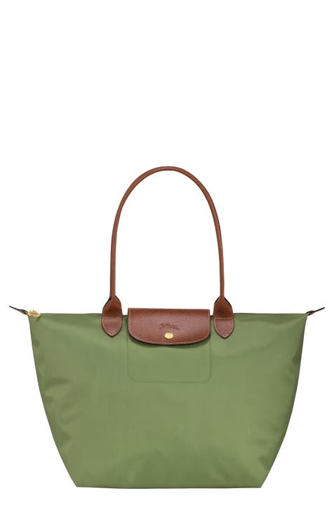 Longchamp Le Pliage clutch both green and brown instock, Women's Fashion,  Bags & Wallets, Purses & Pouches on Carousell