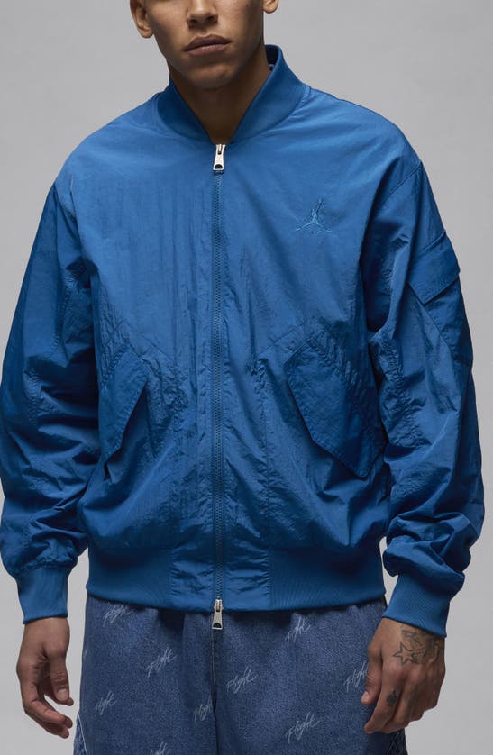 Shop Jordan Essentials Lightweight Nylon Renegade Jacket In Industrial Blue