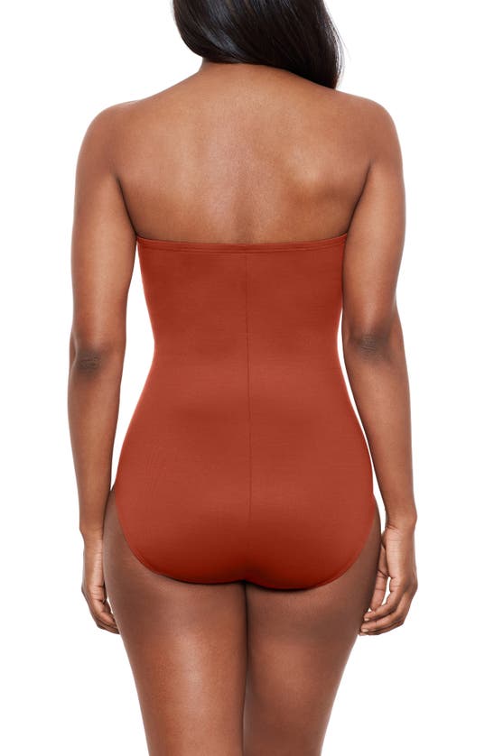 Shop Miraclesuit Rock Solid Madrid Bandeau One-piece Swimsuit In Spice