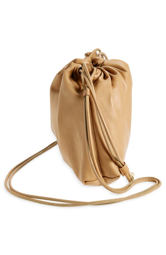 Shop The Row Angy Leather Drawstring Shoulder Bag In Cream