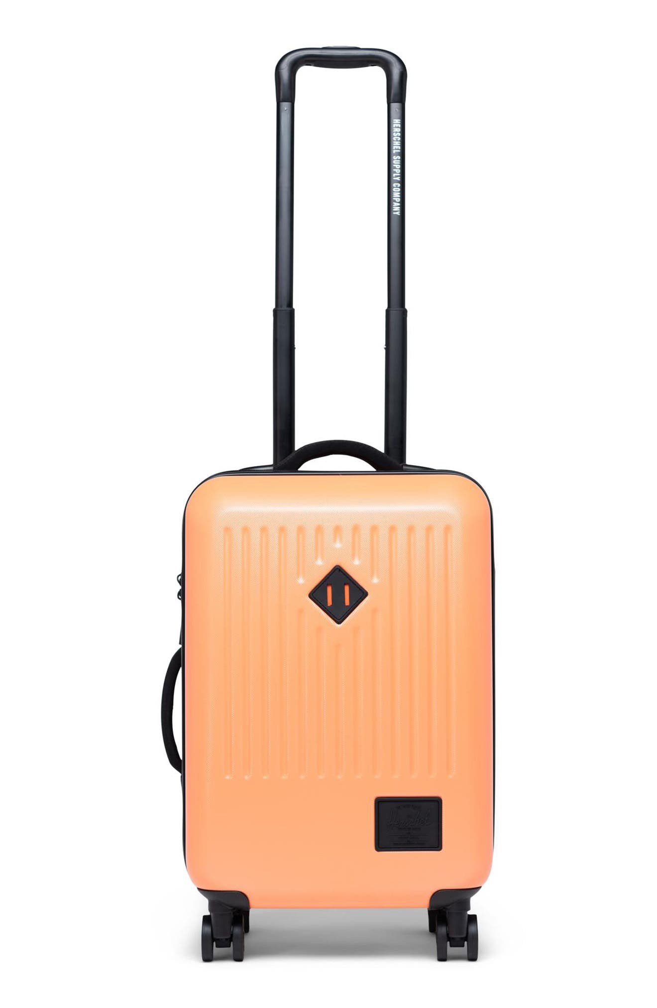 neon orange suitcase