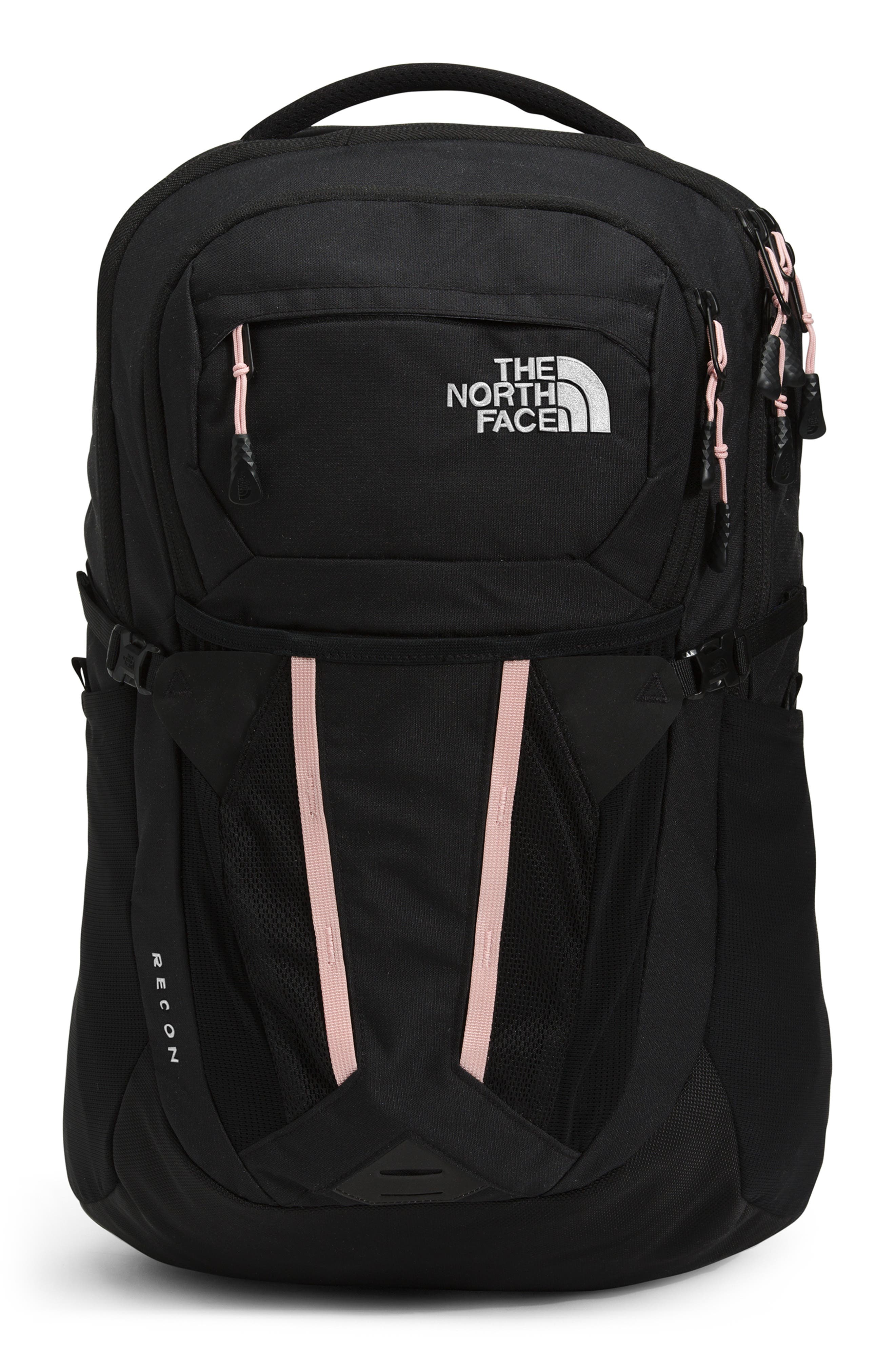 black and pink north face backpack