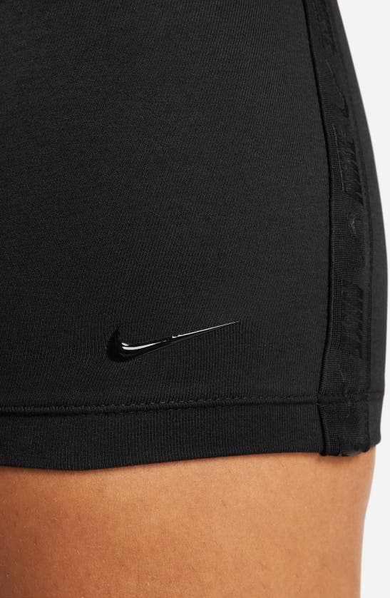Shop Nike Tape Shade Cotton Blend Romper In Black