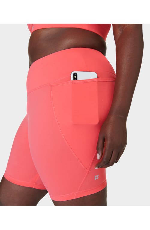 Shop Sweaty Betty Bike Shorts In Coral Pink