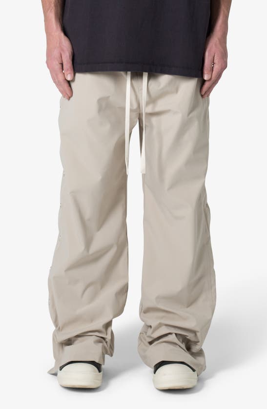 Shop Mnml Oversize Side Snap Nylon Pants In Tan