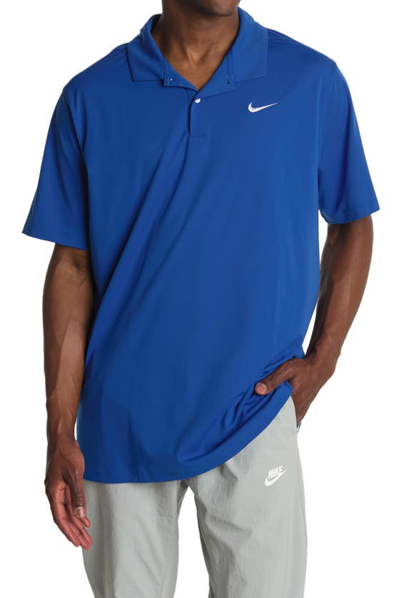Shop Nike Dri-fit Essential Solid Polo Shirt In Game Royal/white