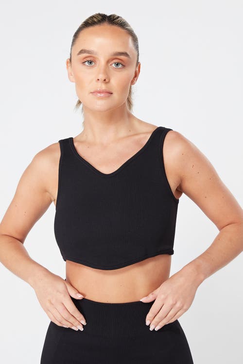 Shop Twill Active Recycled Seamless Rib Dip Hem Sports Bra In Black