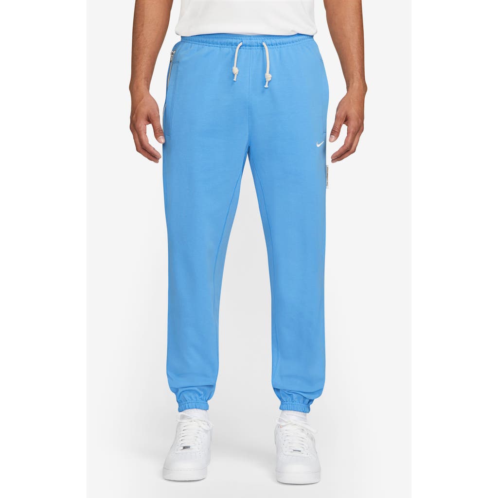 Shop Nike Dri-fit Standard Issue Joggers In University Blue/pale Ivory