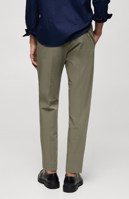 Shop Mango Slim Fit Stretch Pants In Pastel Green