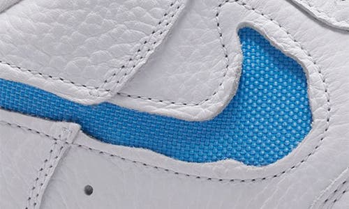 Shop Nike Air Force 1 Low Evo Basketball Sneaker In White/university Blue/white