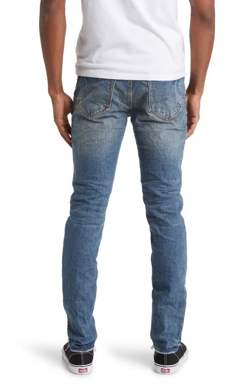 Shop Purple Brand Square Patch Repaired Skinny Jeans In Dk Indigo