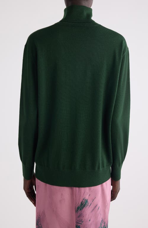 Shop Dries Van Noten Tunnes Merino Wool Turtleneck Sweater In Emerald