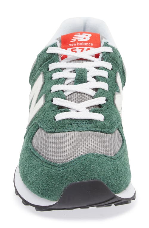 Shop New Balance Gender Inclusive 574 Sneaker In Nightwatch Green/sea Salt