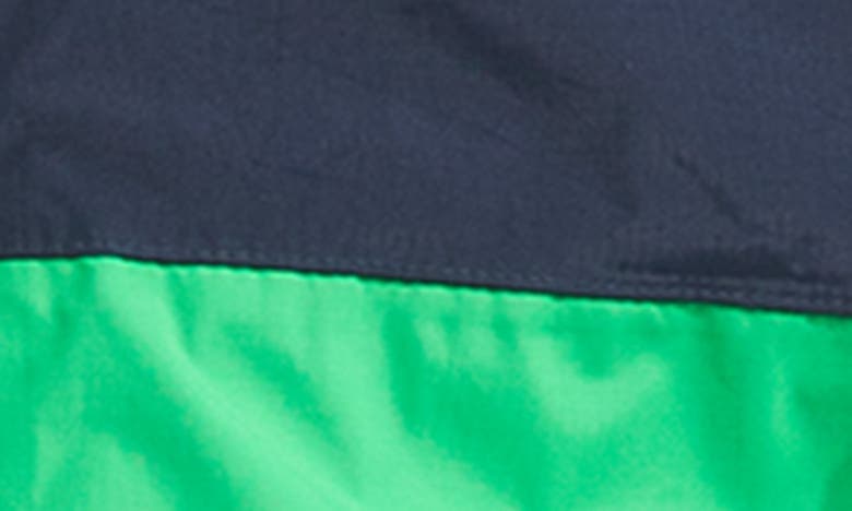 Shop The North Face Antora Waterproof Hooded Rain Jacket In Summit Navy/ Optic Emerald
