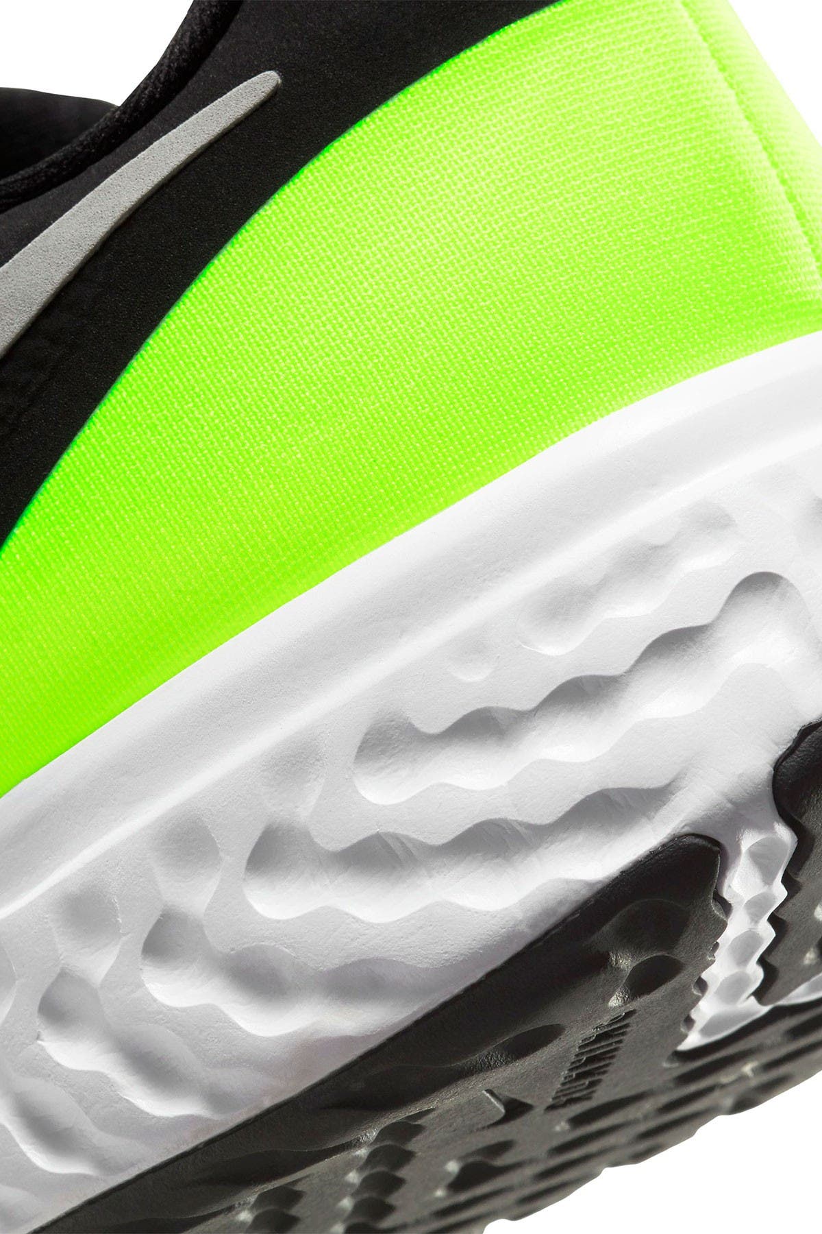 new nike revolution cleats