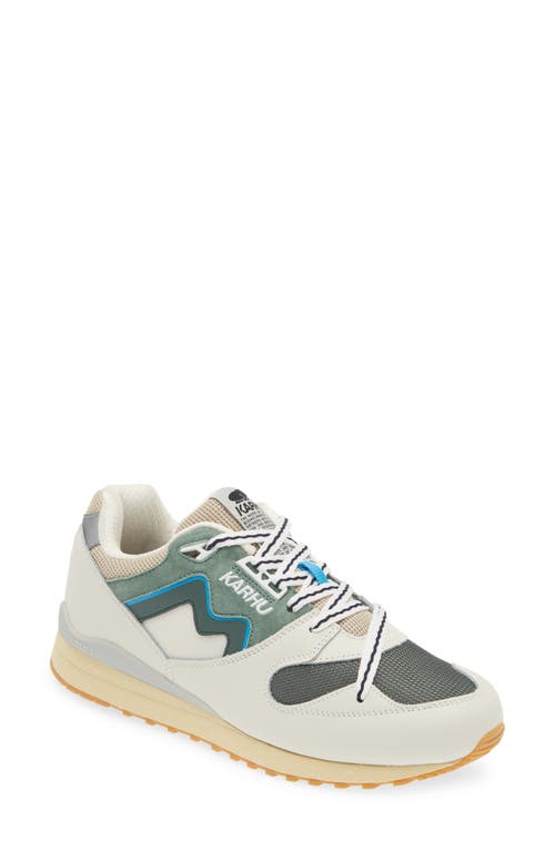Gender Inclusive Synchron Classic Sneaker in Lily White/Forest Green