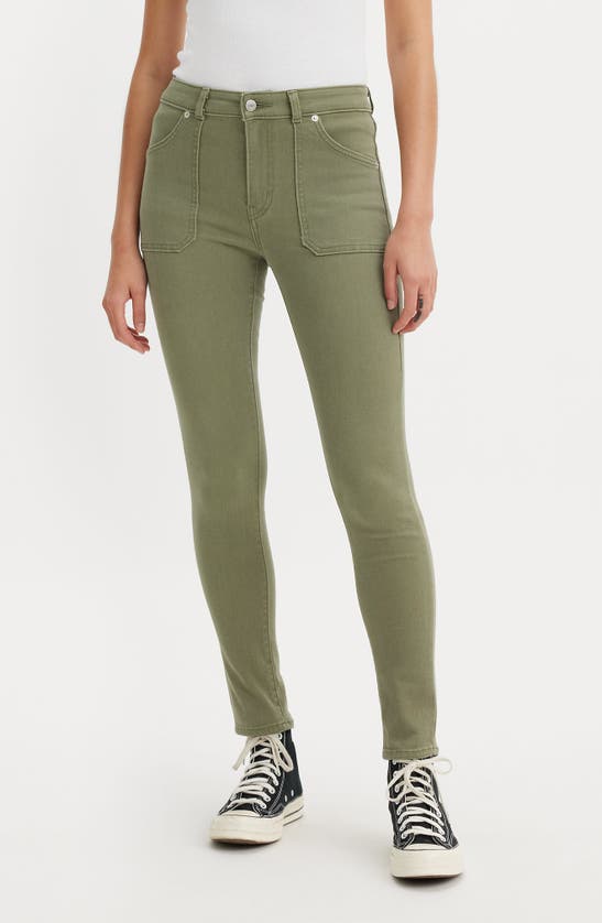 Shop Levi's® 721 High Rise Utility Skinny Jeans In Deep Lichen Green