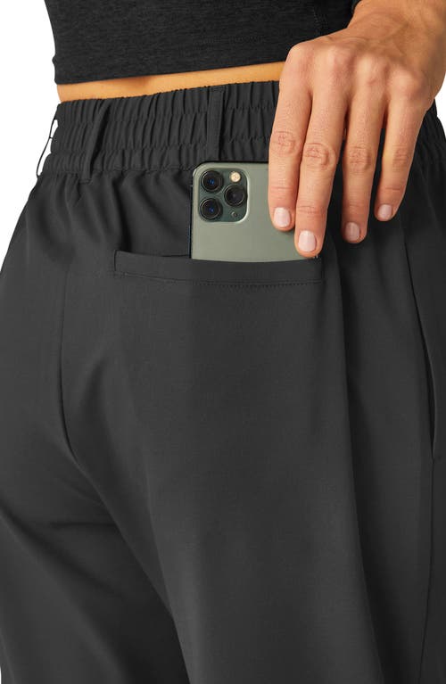 Shop Beyond Yoga Status Trousers In Black