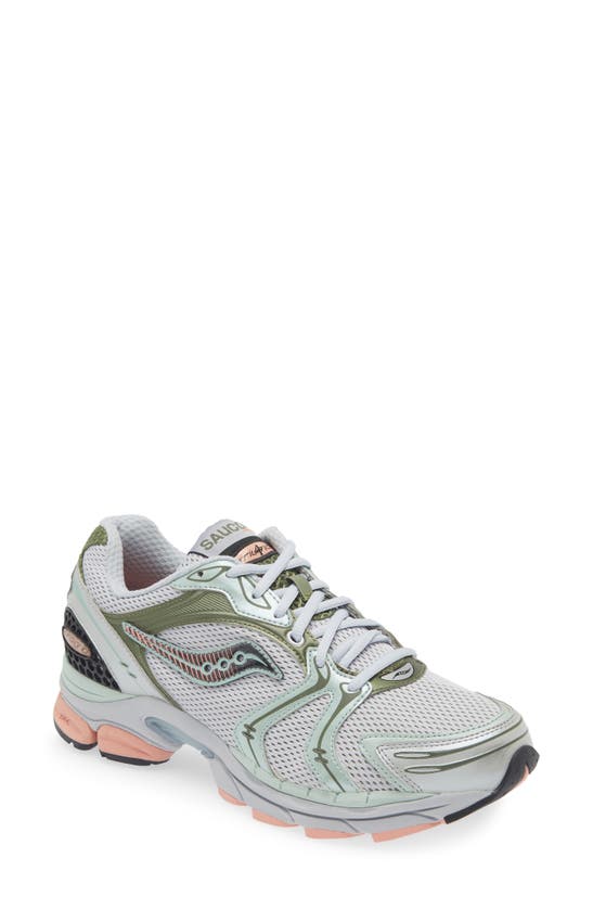 Shop Saucony Progrid Triumph 4 Sneaker In Grey/ Green