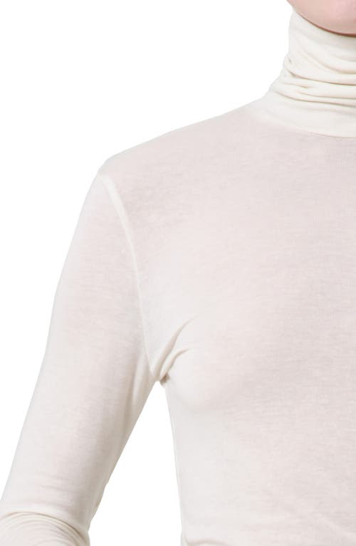 Shop Agolde Pascale Rib Turtleneck Top In Oat Milk