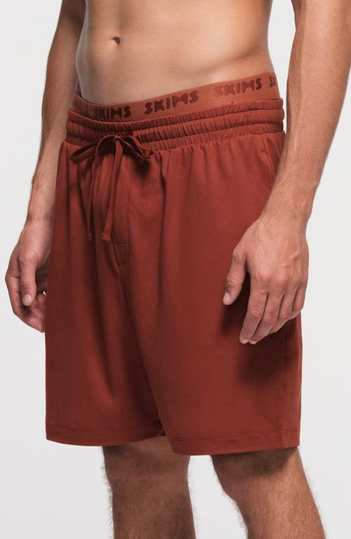 Shop Skims Outdoor Jersey Sweat Shorts In Rust