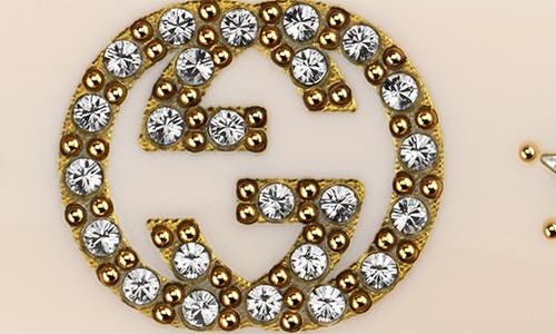 Shop Gucci Gg Star Hair Clip In Gold/cream