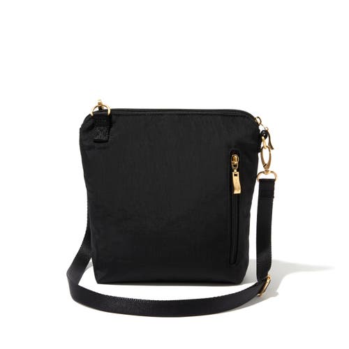 Shop Baggallini Modern Pocket Crossbody Bag In Black With Gold Hardware