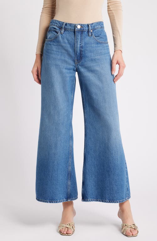 Shop Frame Pixie Easy Wide Leg Flare Jeans In Lucite