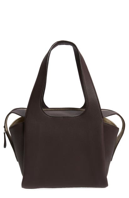 Click to view more detailed imagery on our partner's website The Row Tr1 Leather Shoulder Bag In Aubergine