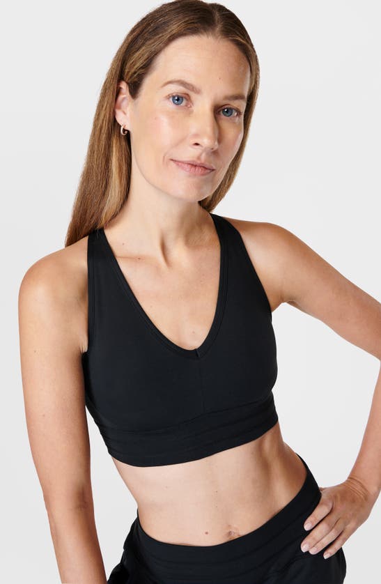 Shop Sweaty Betty Gaia Yoga Sports Bra In Black