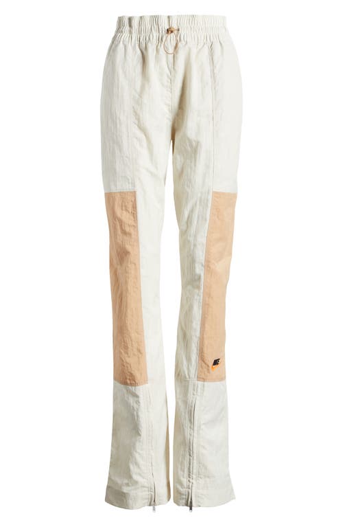 Shop Nike City Utility Zip Cuff Track Pants In Light Orewood Brown/hemp