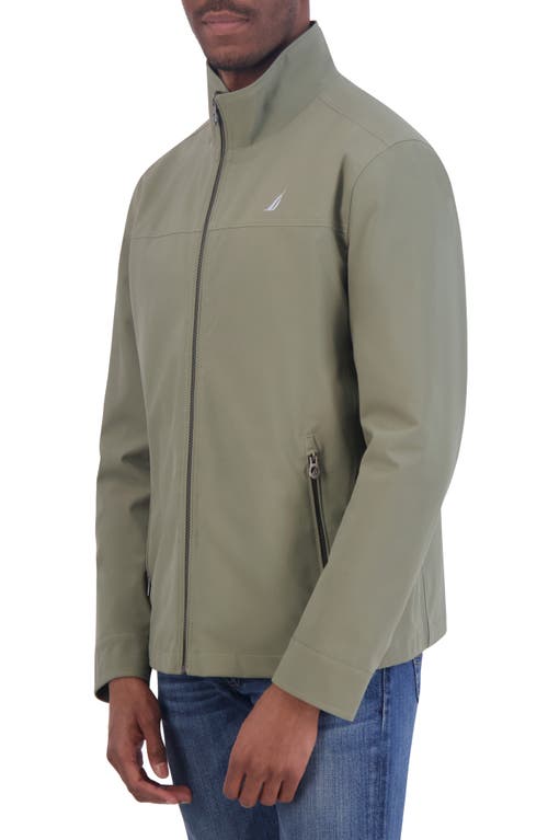 Shop Nautica Lightweight Stretch Water Resistant Golf Jacket In Dusty Olive