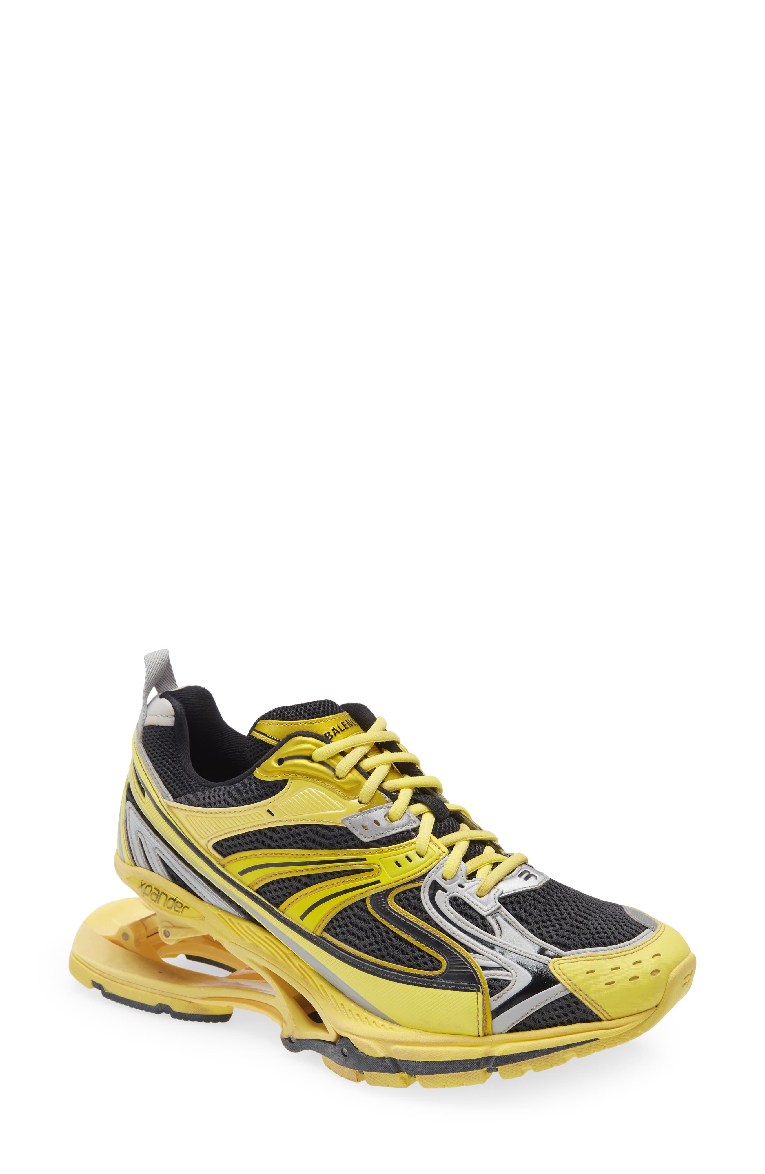 black and yellow tennis shoes