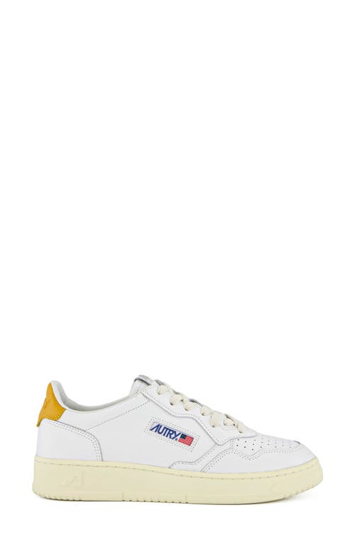 Autry Sneakers In Leat/leat Wht/hny Ylw
