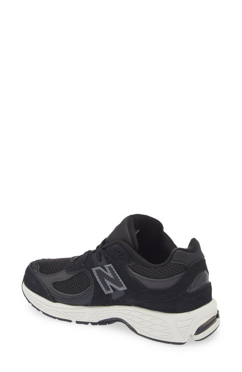 Shop New Balance Kids' 2002 Sneaker In Black/phantom