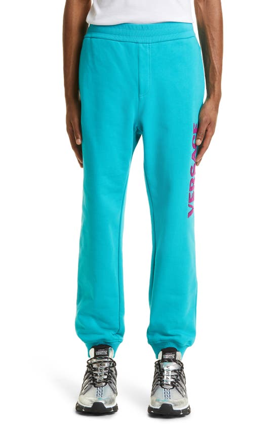Versace Varsity Patch Cotton Logo Joggers In Turquoise/purple
