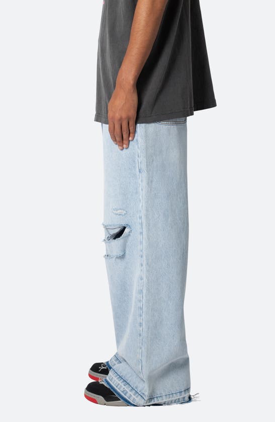 Shop Mnml Baggy Rave Ripped Wide Leg Jeans In Light Blue