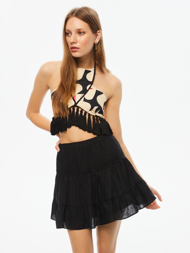 Shop Nocturne Tiered Mini Linen Skirt In Black