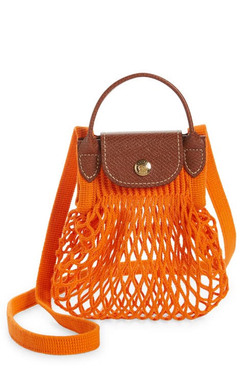Passerby Wearing Longchamp Orange Net Bag Editorial Stock Photo
