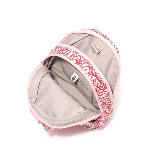 Shop Baggallini Double Zip Mini Sling Bag In Heart Print