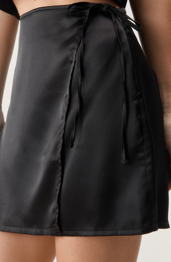 Shop Nasty Gal Satin Wrap Miniskirt In Black