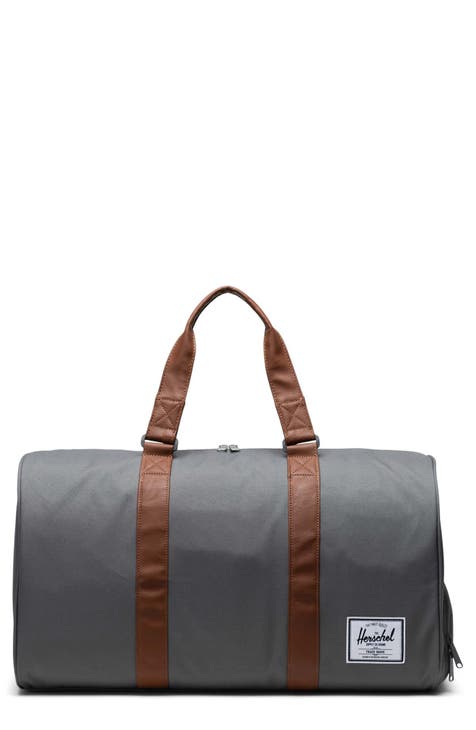 Spennanight Duffle bag with 4 pockets and over the shoulder strap. (Spend  the night bag)