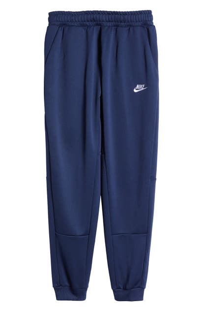 Click to view more detailed imagery on our partner's website Nike Sportswear Tech Pack Tribute Joggers In Midnight Navy/ White