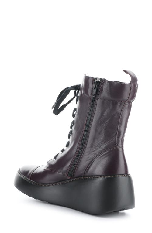 Shop Fly London Daff Wedge Combat Boot In Dark Purple Sofia