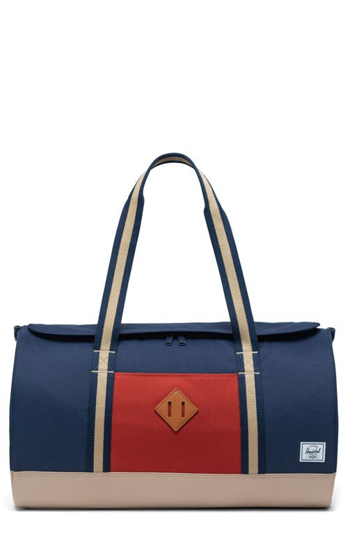 Shop Herschel Supply Co . Heritage Duffle Bag In Black Iris/red Ochre/twill