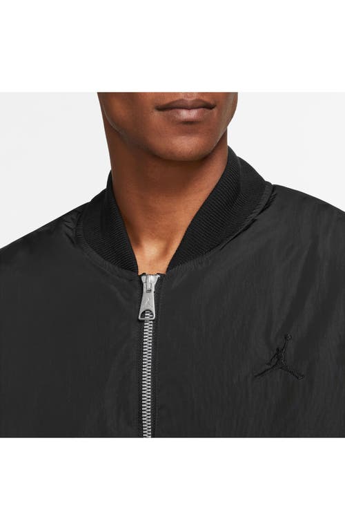 Shop Jordan Essentials Renegade Water Repellent Bomber Jacket In Black/black