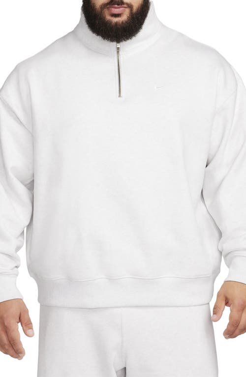 Shop Nike Solo Swoosh Oversize Quarter Zip Sweatshirt In Birch Heather/white