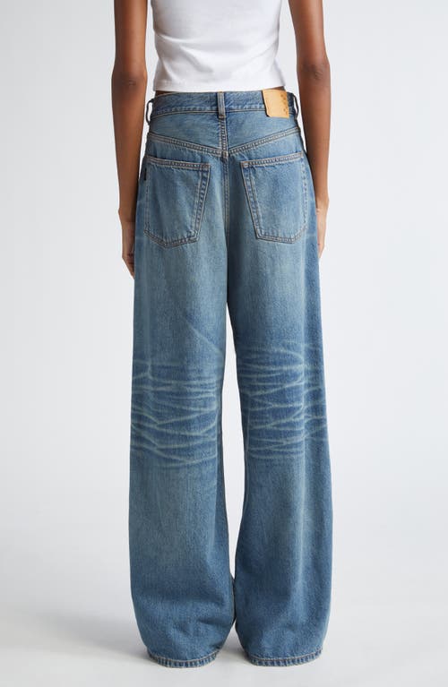 Shop Haikure Candy Pleated Wide Leg Jeans In Blue Tencel