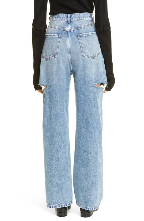 Shop Maison Margiela Ripped Side Cutout Jeans In Denim