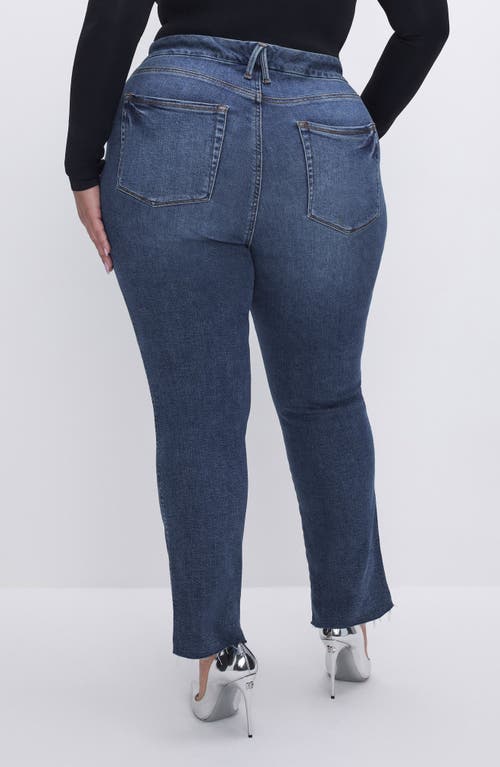 Shop Good American Good Curve Step Hem Straight Leg Jeans In Indigo522